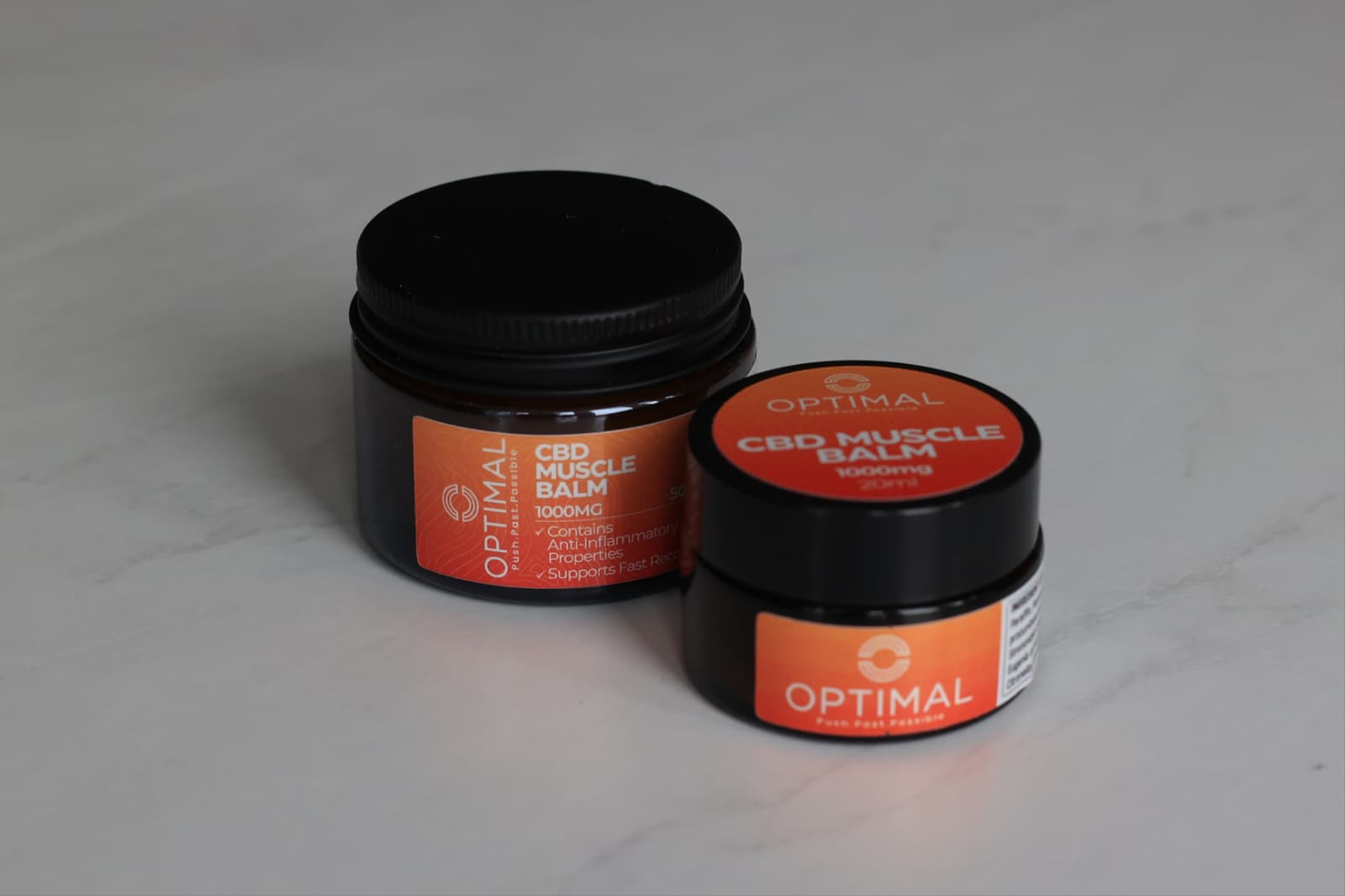 Optimal CBD Muscle Balm in 50ml and 20ml sizes side by side